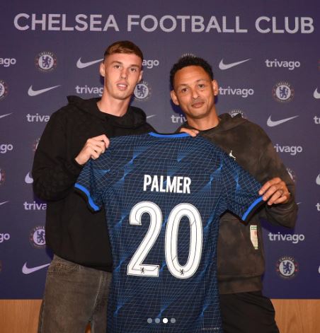Cole Palmer with his father Jermaine when he signed with Chelsea